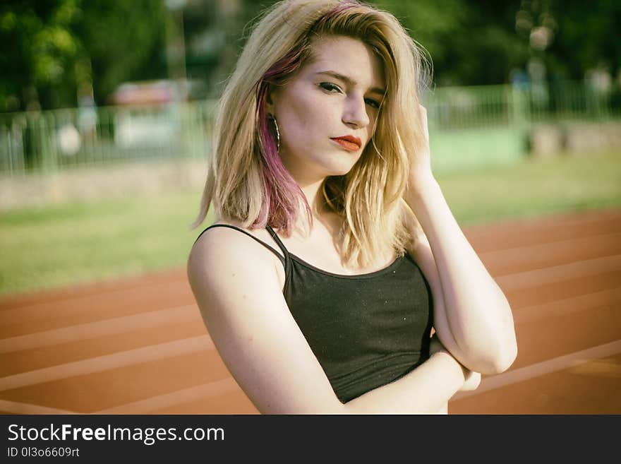 Woman Wearing Dark-green Spaghetti Strap Top