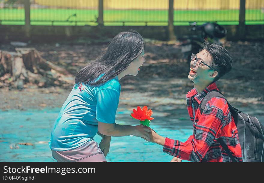 Photography of a Man And Woman Laughing