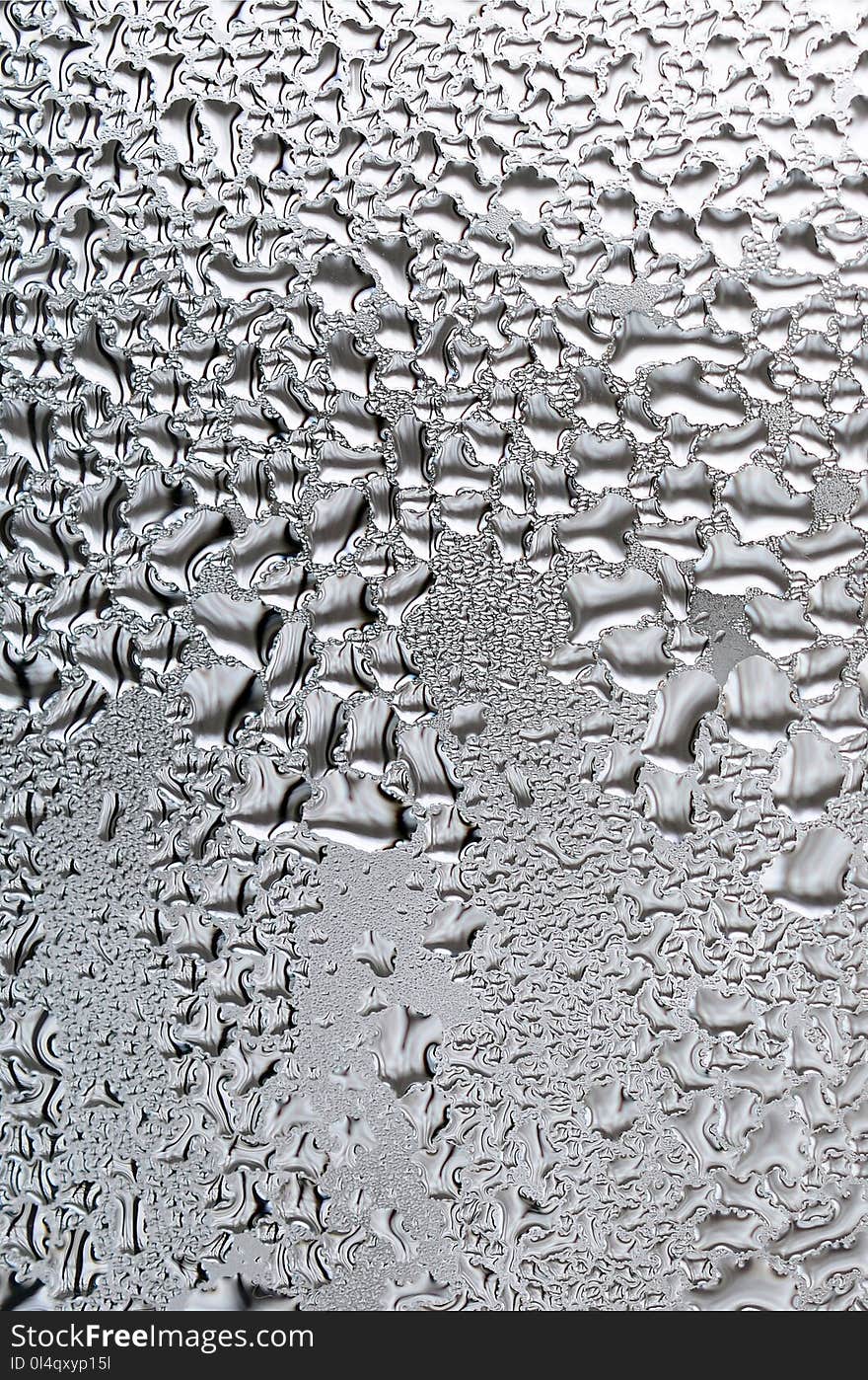 Texture of a drop of rain on a glass wet transparent background.