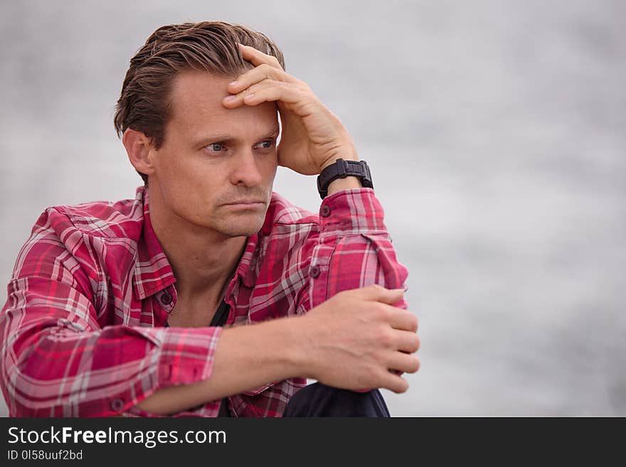 Photo of Man Wearing Pink Sport Shirt