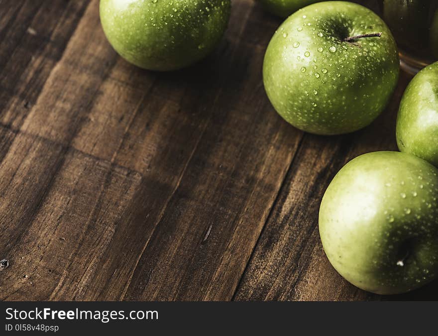 Four Granny Smith Apples