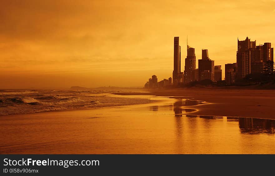 Sea Waves Near High-rise Building