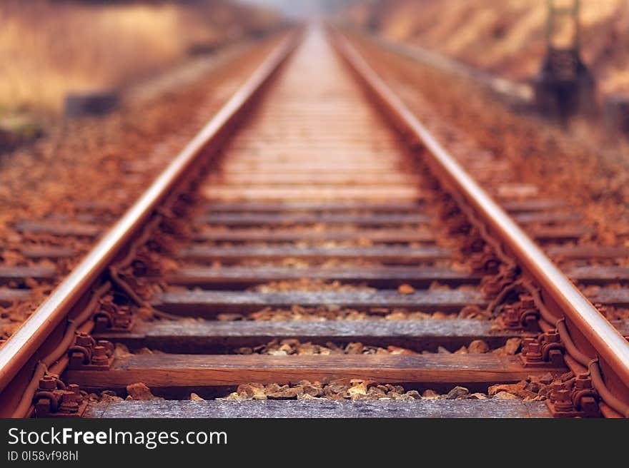 Shallow Focus Photo of Train Rail