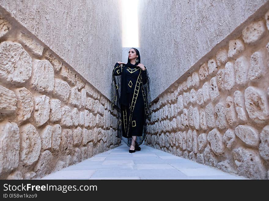 Photo of Woman Wearing Black Dress