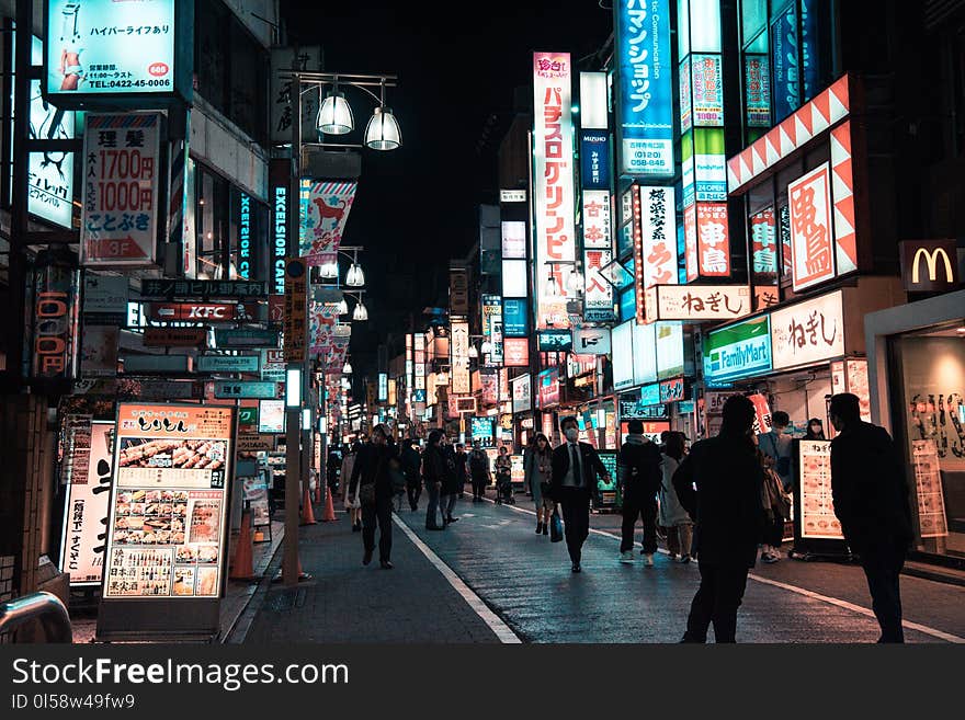 Street With People Walking during Night