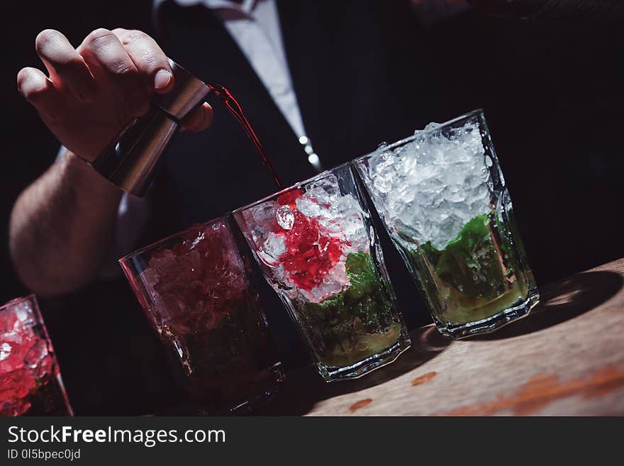 Preparation of long cocktails. Close-up