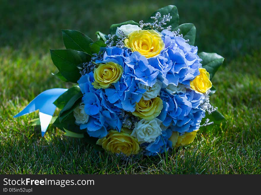 Wedding is always special. Wedding bouquet in blue and yellow colors brings light and joy. Wedding is always special. Wedding bouquet in blue and yellow colors brings light and joy