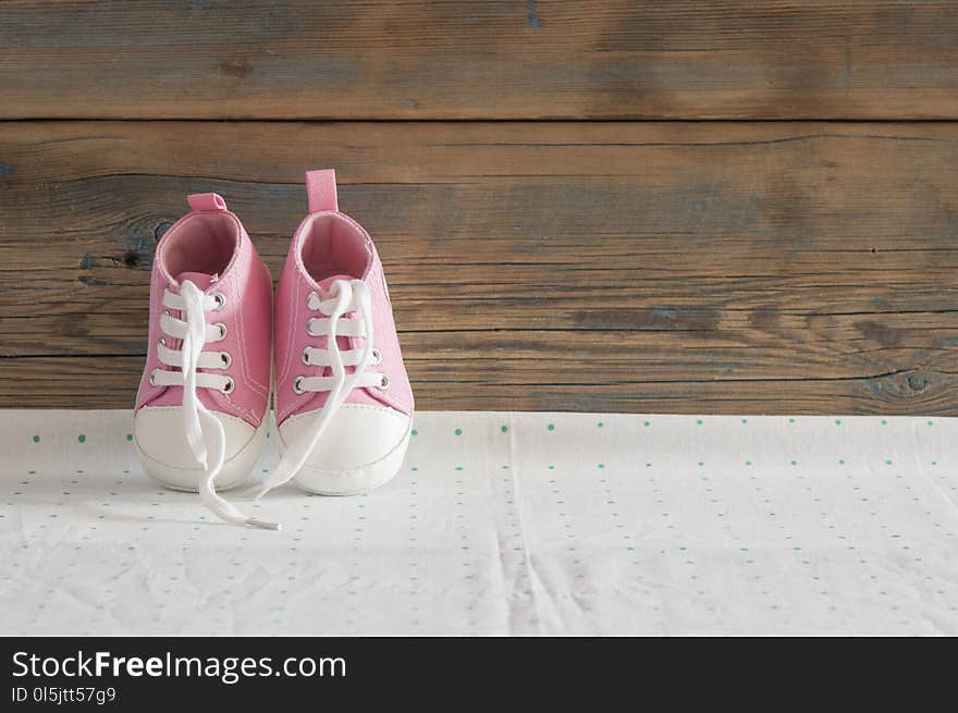 Cute small sized canvas shoes top view on white background with