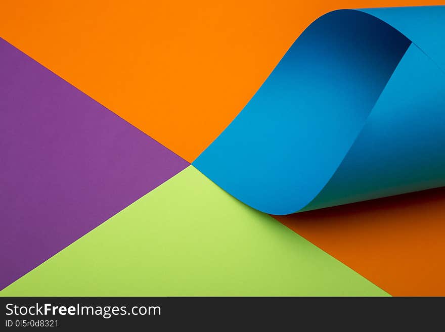 Abstract background of sheets of colored paper