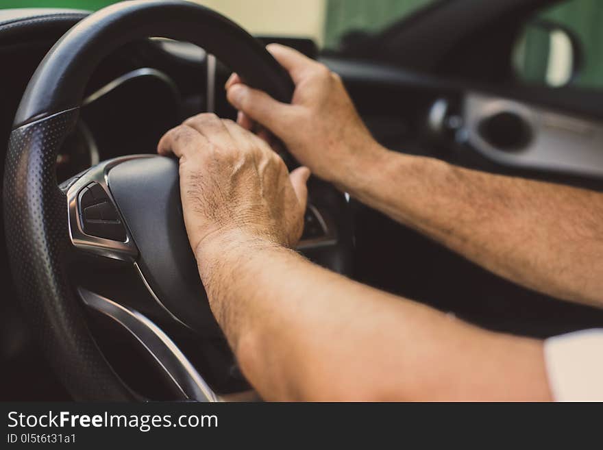 Senior man in car. Senior man driving car.