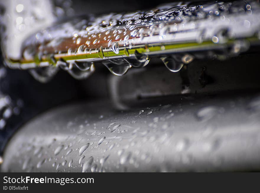 Rain Drops, Water Drops on Hood of Automobile - Car detailing