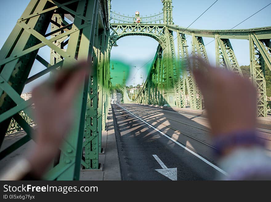 Looking through the green sunglasses on the Liberty bridge in Budapest, Hungary. Looking through the green sunglasses on the Liberty bridge in Budapest, Hungary