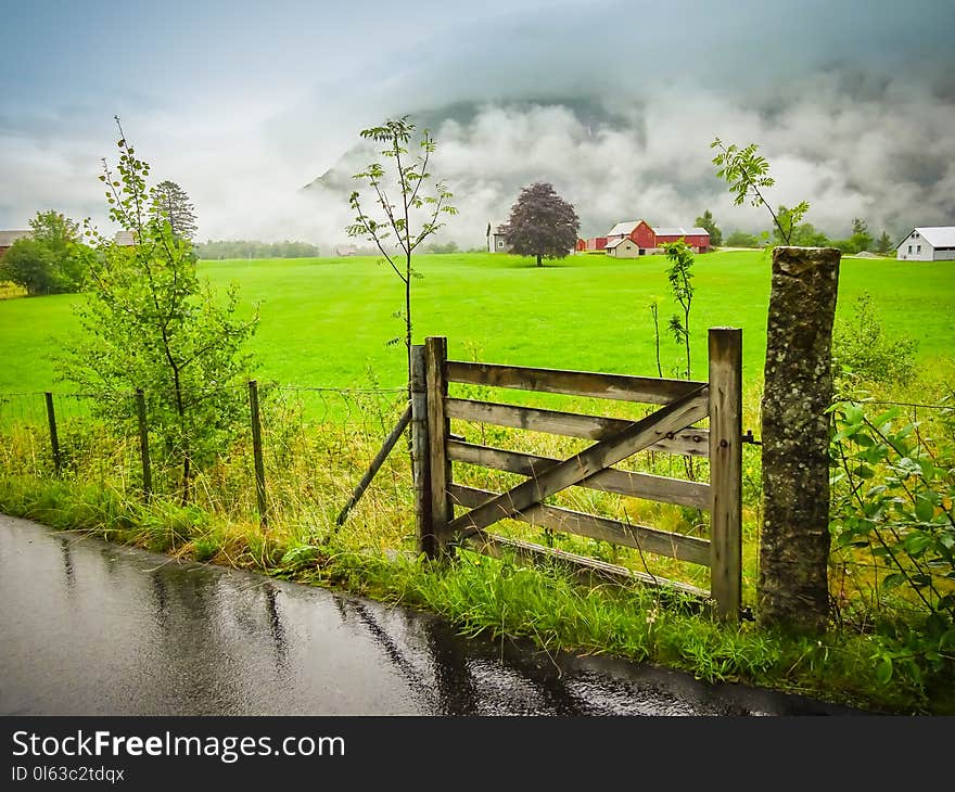 Wooden countryside gate at farm, Norway.