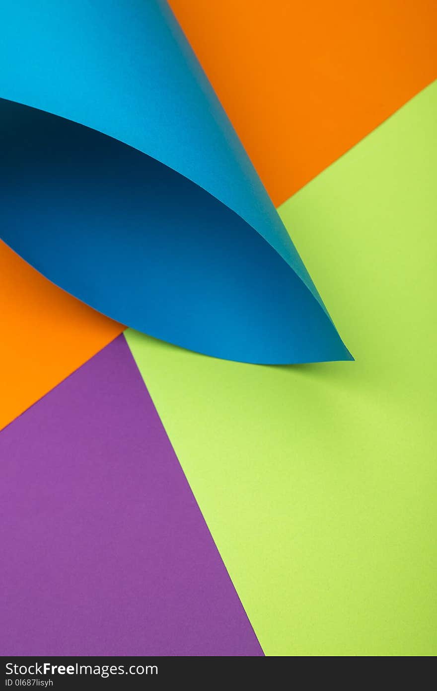 Abstract background of sheets of colored paper