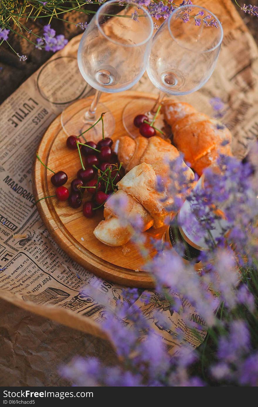 Closeup Photo of Bread With Fruits on Round Brown Tray