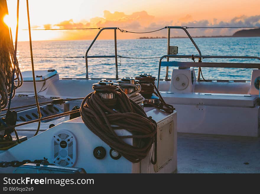 White Deck of Boat in Middle of Sea