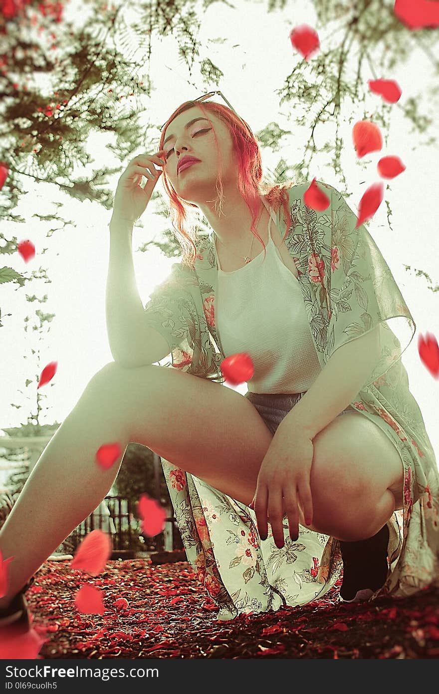 Woman Wearing Gray Cardigan and White Halter Top