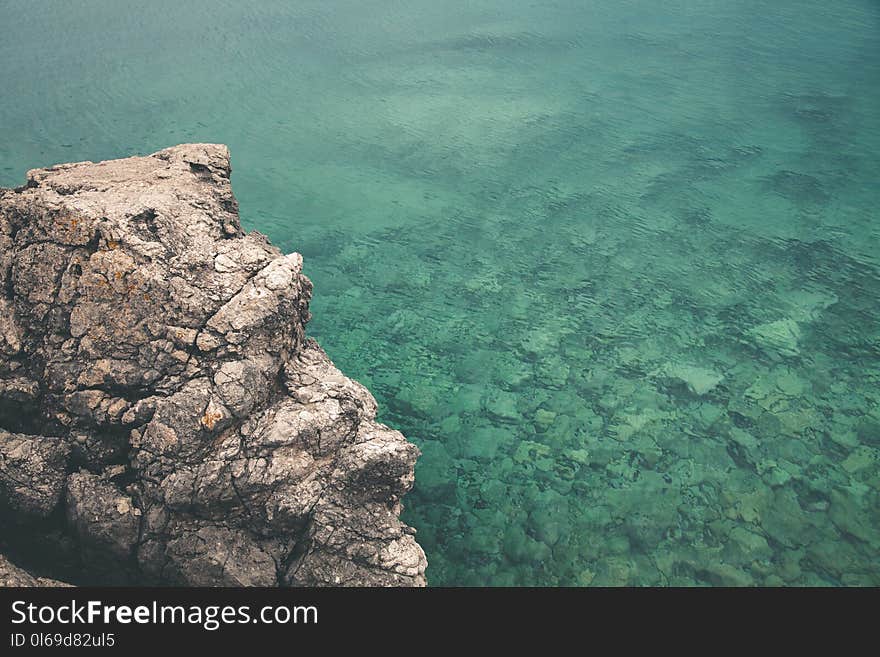 Body of Water Near Mountain