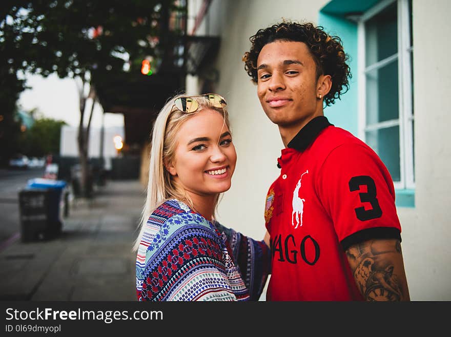 Man Wearing Red and Black Polo Shirt