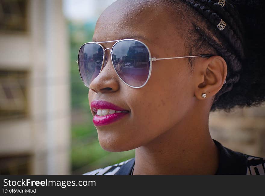 Woman Wearing Gray Framed Sunglasses and Pink Lipstick