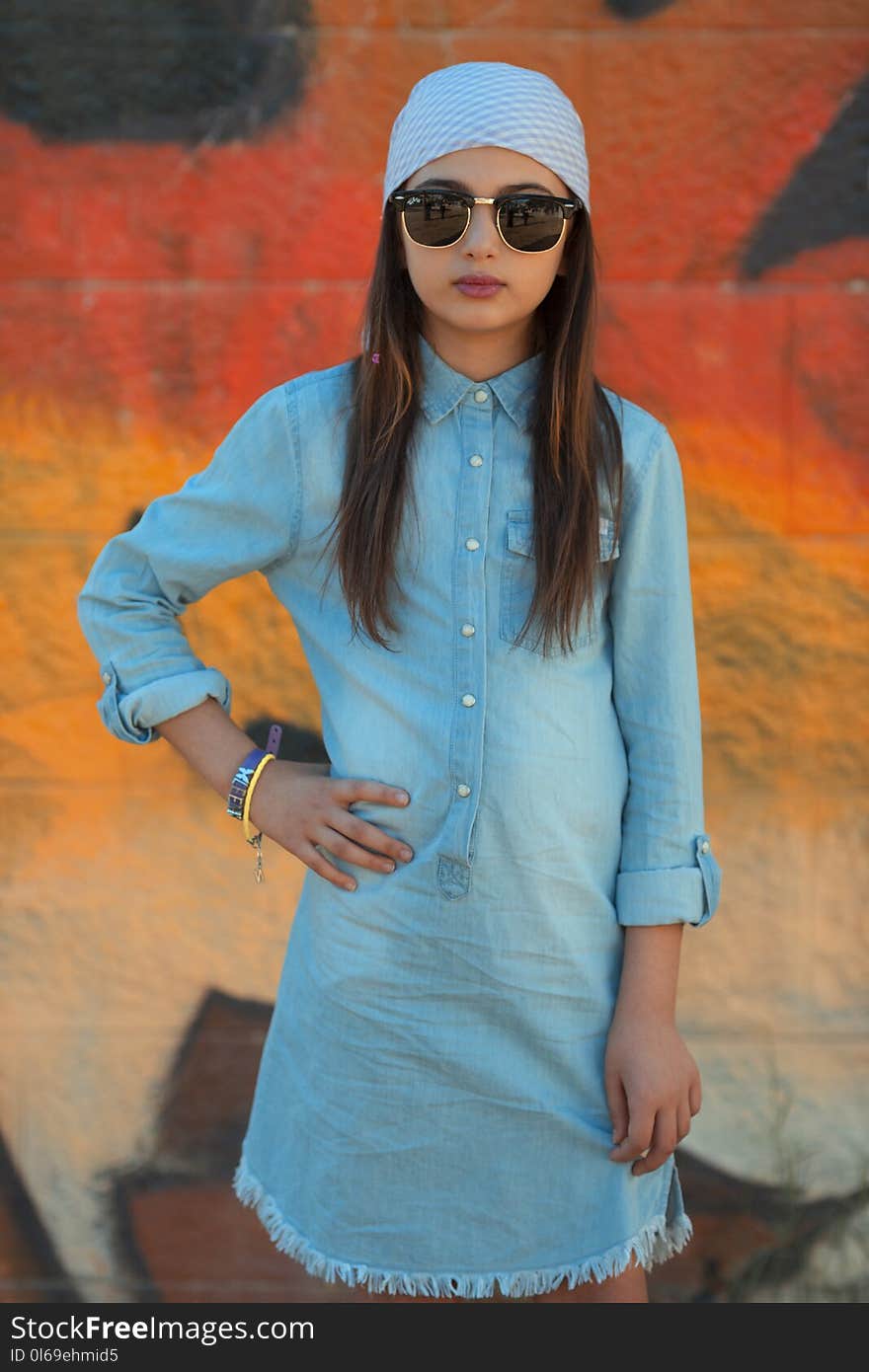 Girl Wearing Blue Chambray Dress Wearing Sunglasses