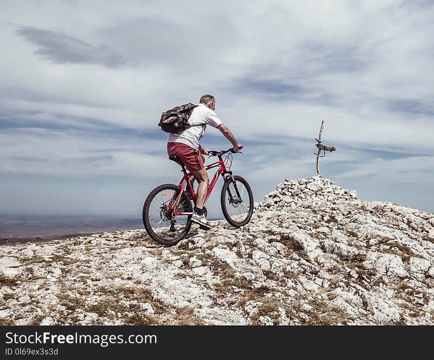 Man Riding Bicycle on Off-road