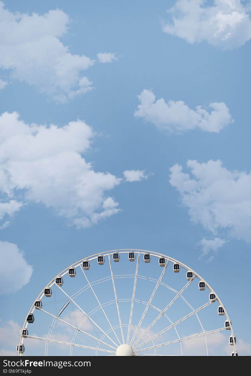 White Ferris Wheel Under White Cloudy Blue Sky