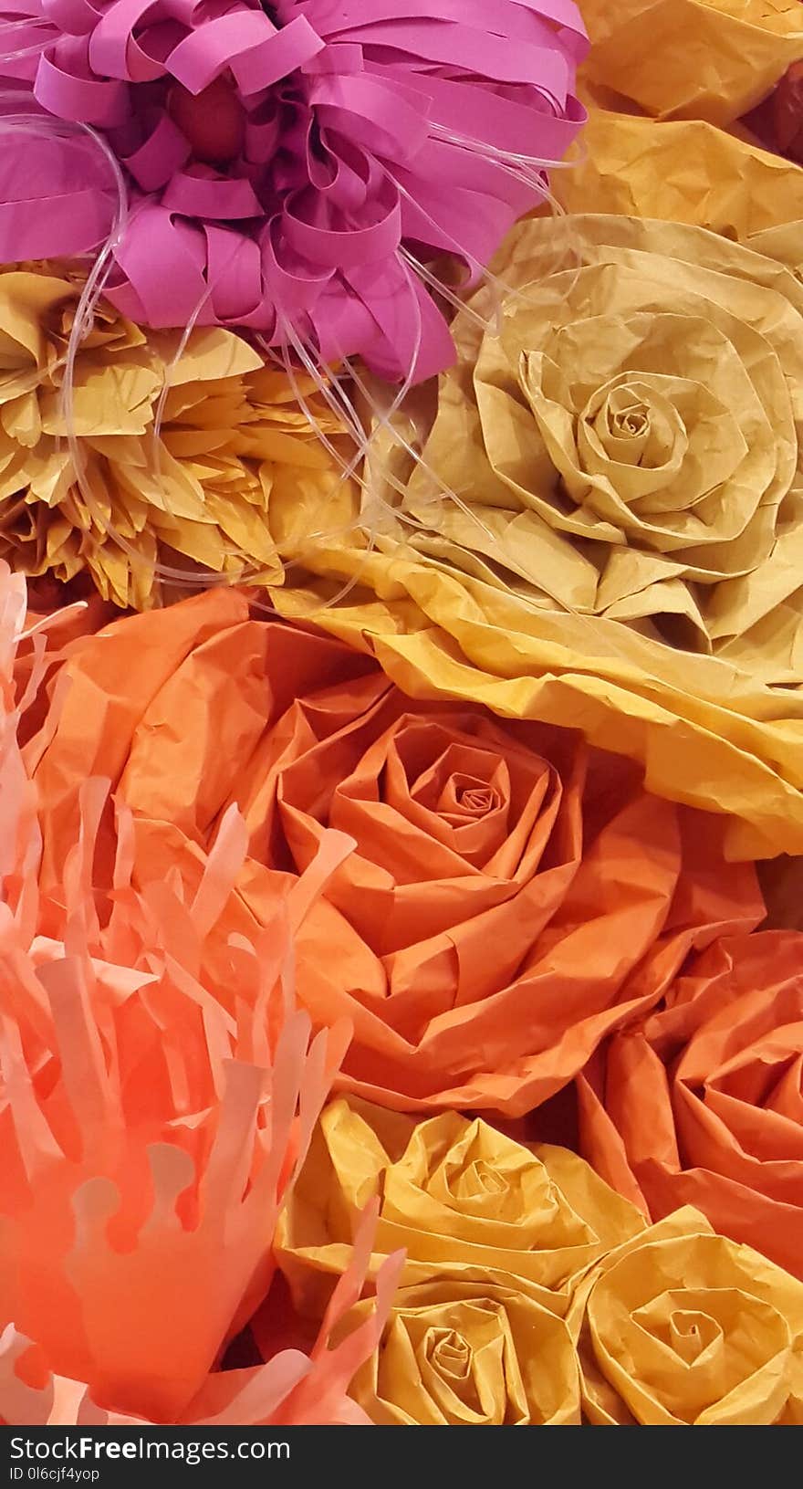Close-up of artificial flower handicraft made from colorful papers for card and background, represent colorful of spring and summer.