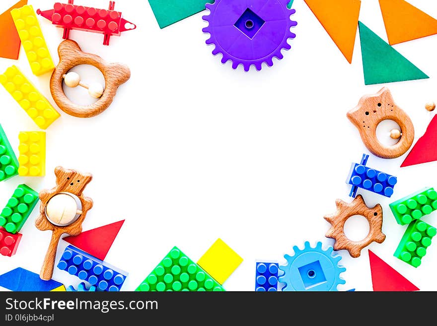 Colored construction toys mockup on white background top view copy space