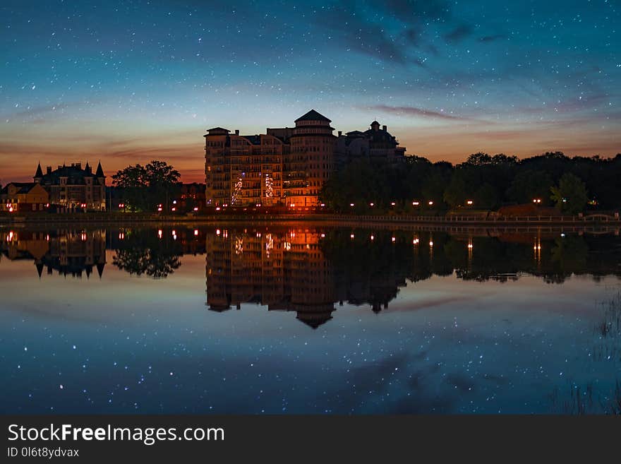 Landscape Photo of Building Near Body of Water