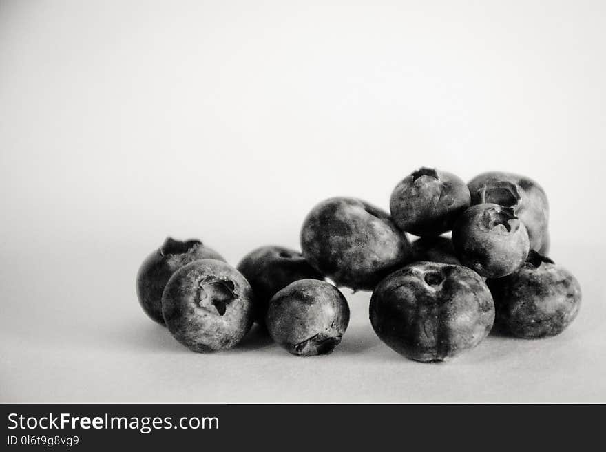 Grayscale Photography of Blueberries