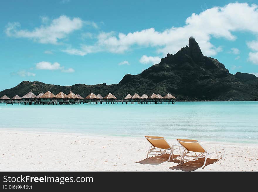 An Island with Cottages and Beach Chairs.