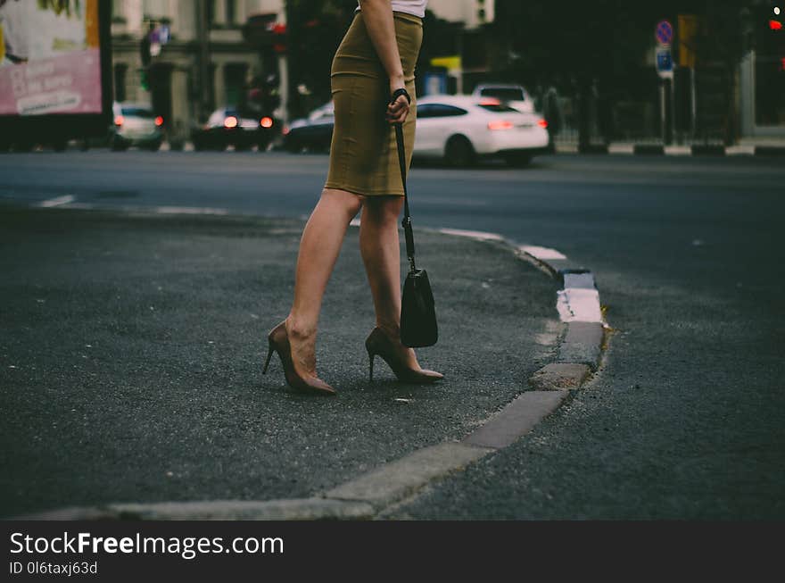 Woman&#x27;s Holding Black Sling Bag