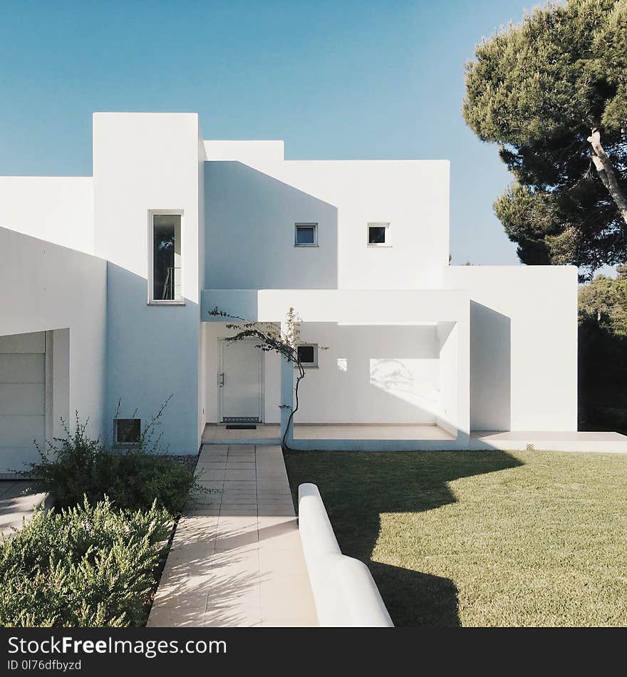 White 2-storey House Near Trees