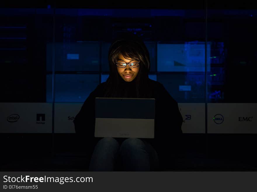 Woman working on her computer.