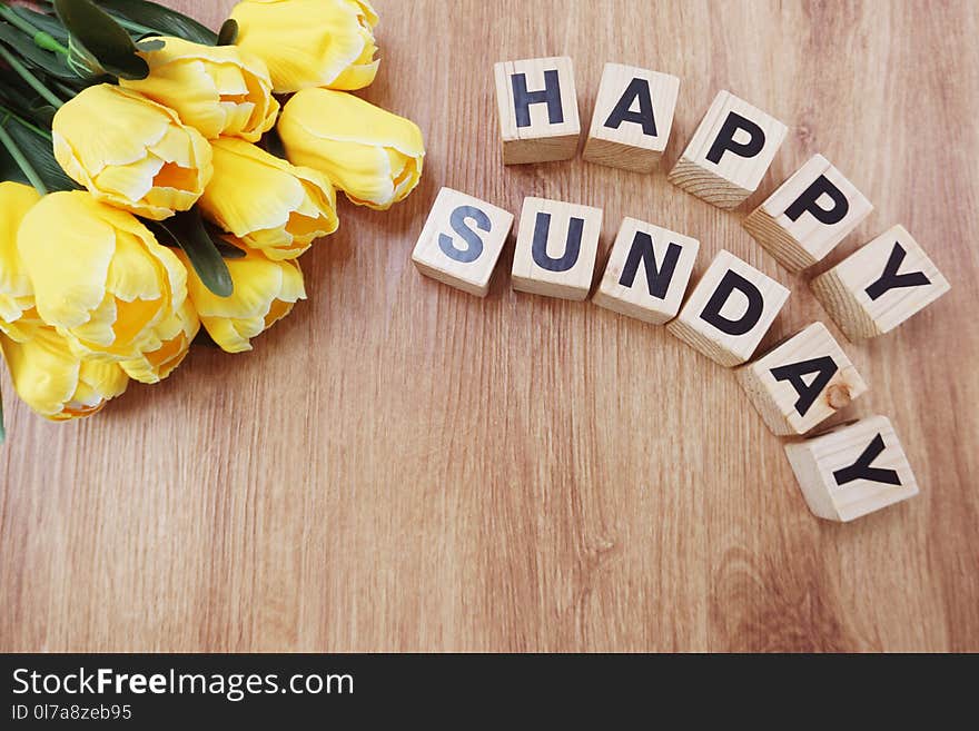 Happy Sunday On Wooden Background