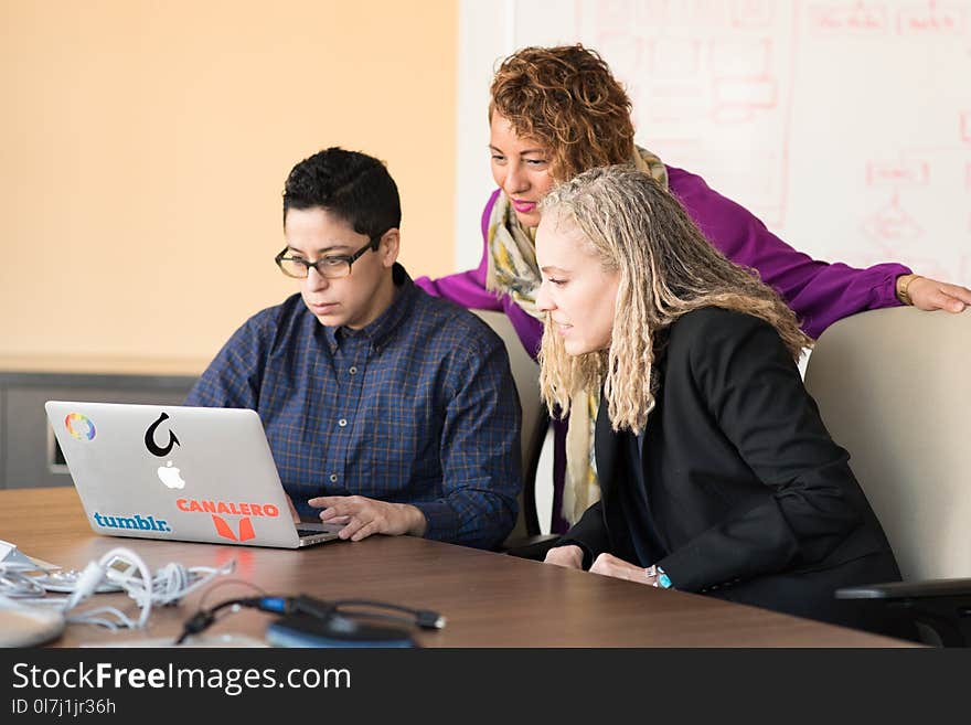 Man in Blue Dress Shirt Using Laptop