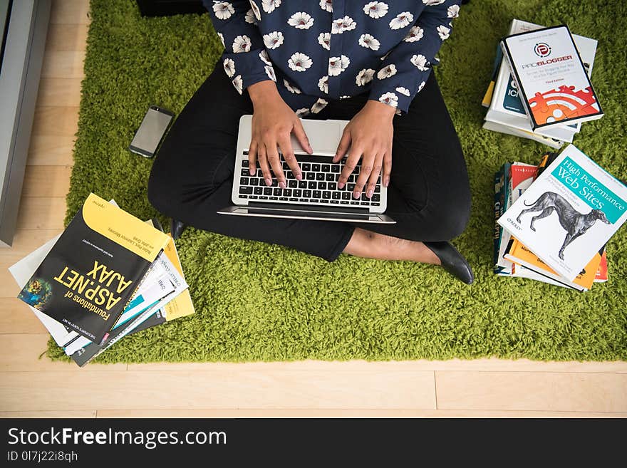 Person Holding Macbook Flatray Photograph