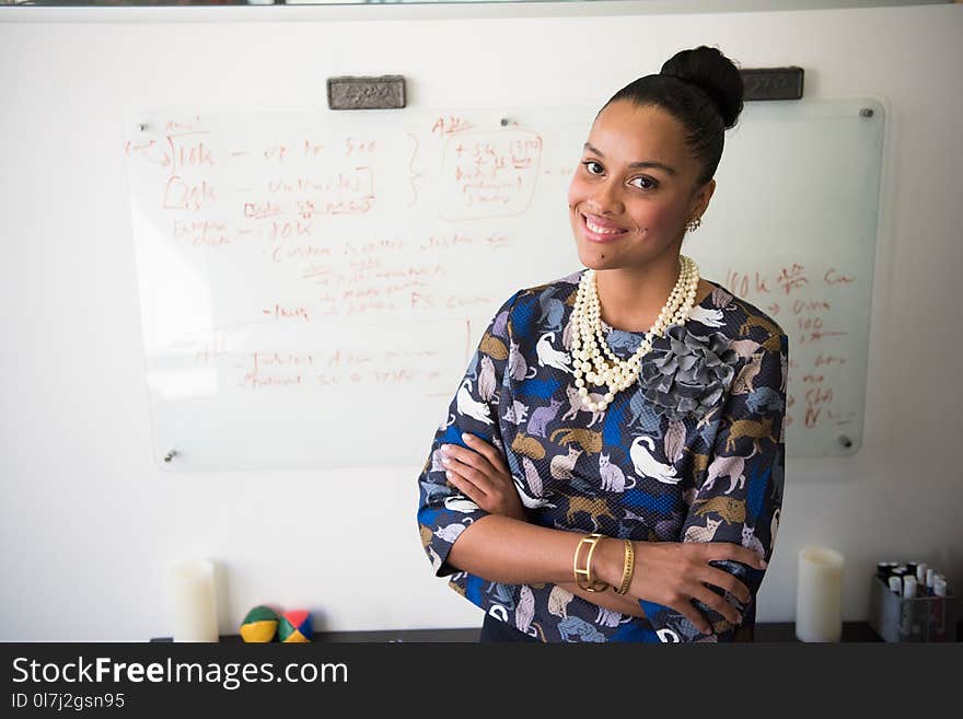 Woman Standing in Front of Whiteboard