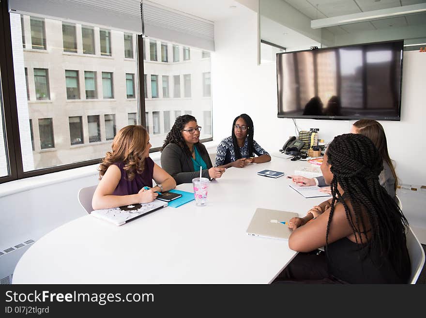 Group of Five Women Gathering Inside Office