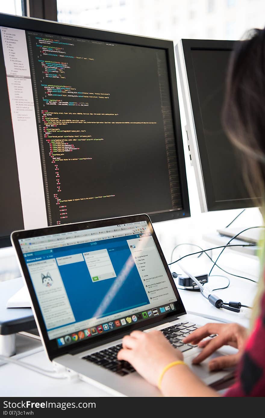 Photography of Woman Using Laptop