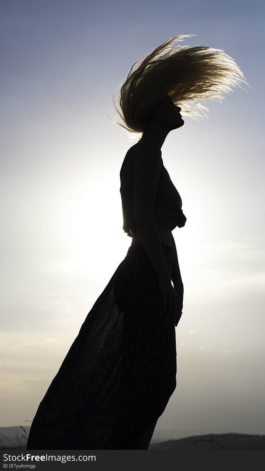 Woman Standing Waving Hair