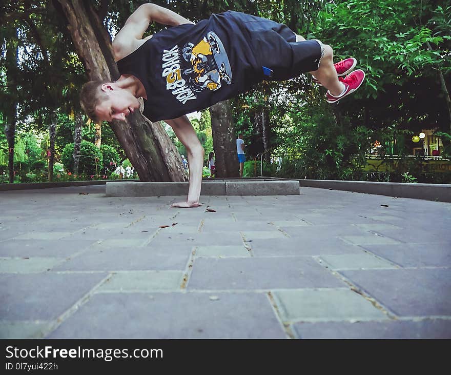 Person Balancing Using One Hand