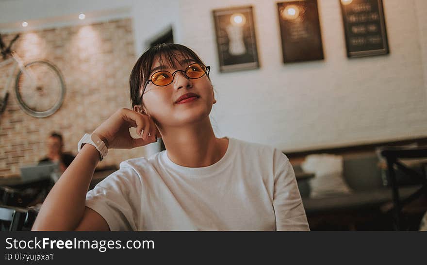 Woman in White Crew-neck Shirt