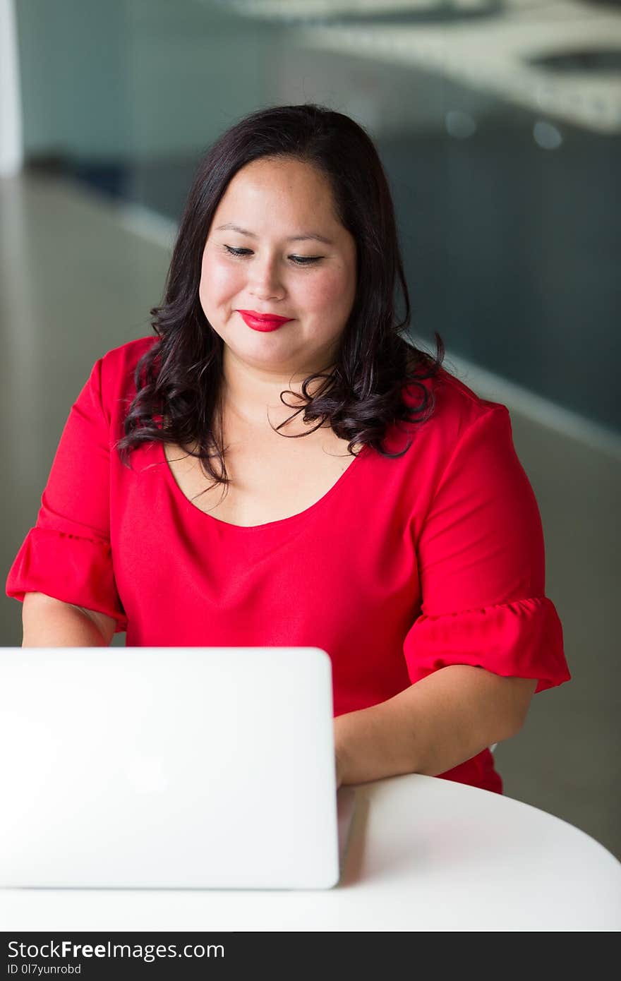 Photography of Woman Using Laptop