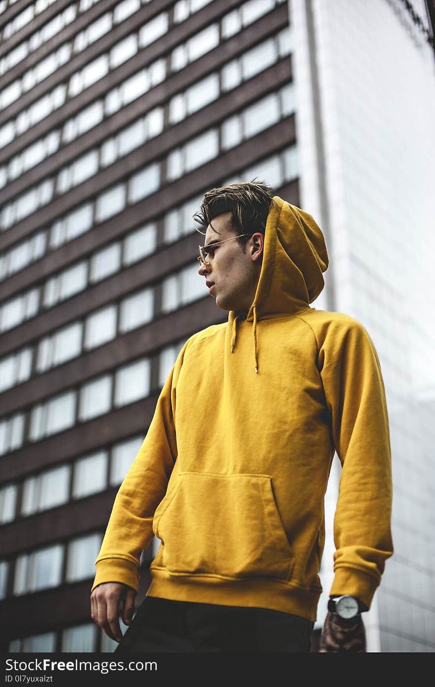 Photography of Guy Wearing Yellow Hoodie