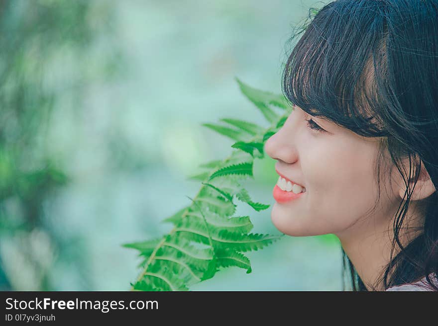 Close-Up Photography of Woman Smiling