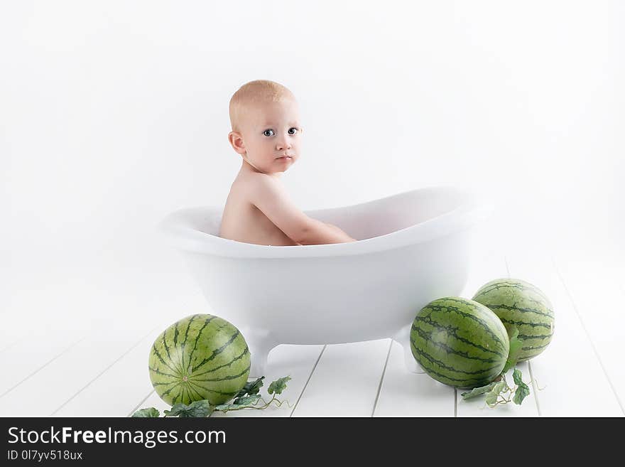 Photography of Baby On Bathtub