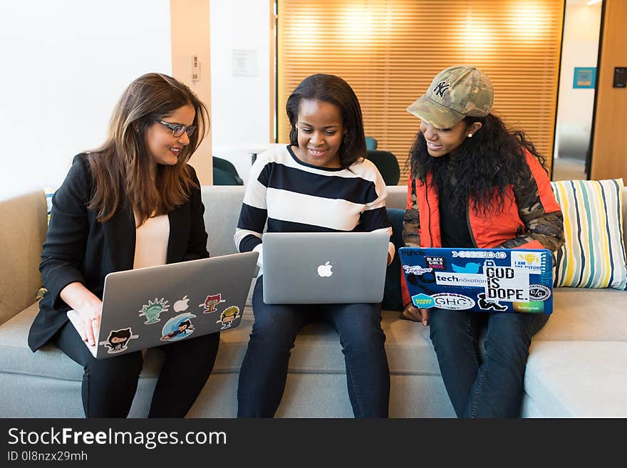 Three Woman in Front of Laptop Computer