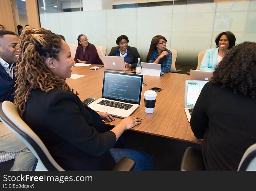 Group of People Using Laptop Computer